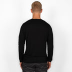 model wearing black merino wool longsleeve from back