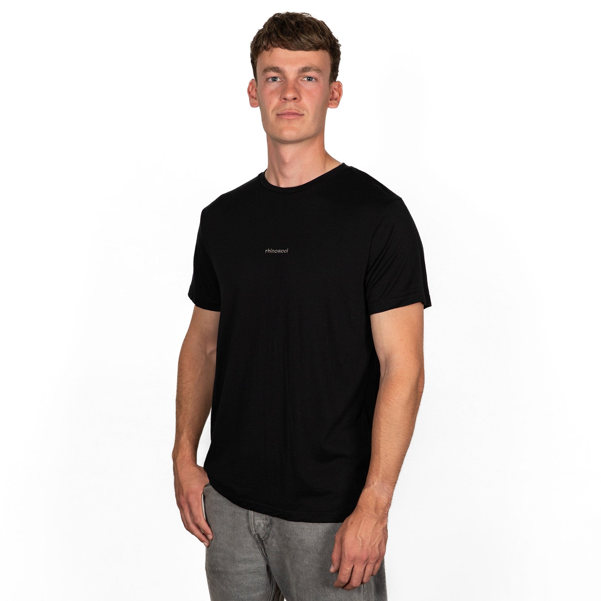model wearing black merino wool t-shirt from side