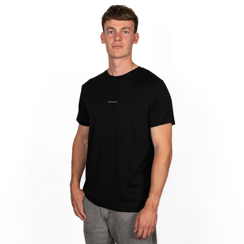 model wearing black merino wool t-shirt from side