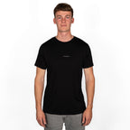 model wearing black merino wool t-shirt from front